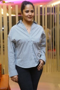 anchor and actress Anasuya Bharadwaj photoshoot in a shirt