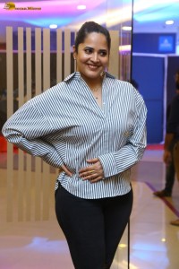 anchor and actress Anasuya Bharadwaj photoshoot in a shirt