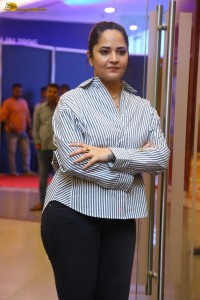 anchor and actress Anasuya Bharadwaj photoshoot in a shirt