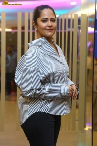 anchor and actress Anasuya Bharadwaj photoshoot in a shirt