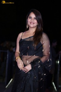 anchor and actress Anasuya Bharadwaj ravishing looks in a black saree