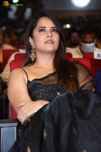 anchor and actress Anasuya Bharadwaj ravishing looks in a black saree