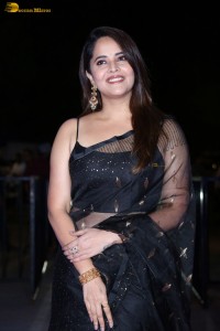 anchor and actress Anasuya Bharadwaj ravishing looks in a black saree