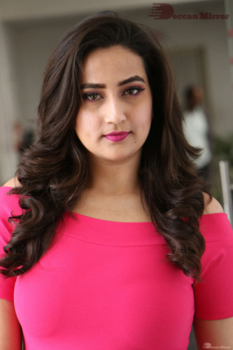 Telugu Actress Manjusha in a pink dress