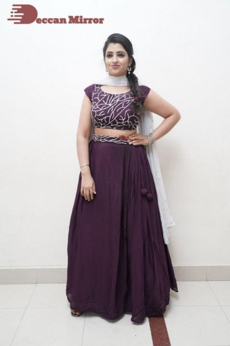 TV Anchor Syamala poses for pictures in a purple dress