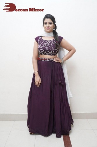 TV Anchor Syamala poses for pictures in a purple dress