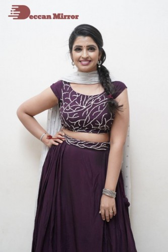 TV Anchor Syamala poses for pictures in a purple dress