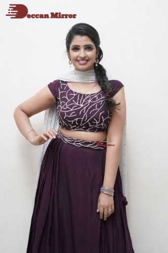 TV Anchor Syamala poses for pictures in a purple dress