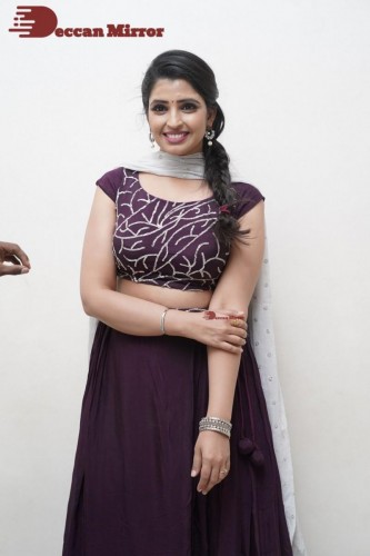 TV Anchor Syamala poses for pictures in a purple dress