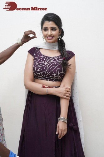 TV Anchor Syamala poses for pictures in a purple dress