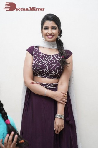 TV Anchor Syamala poses for pictures in a purple dress
