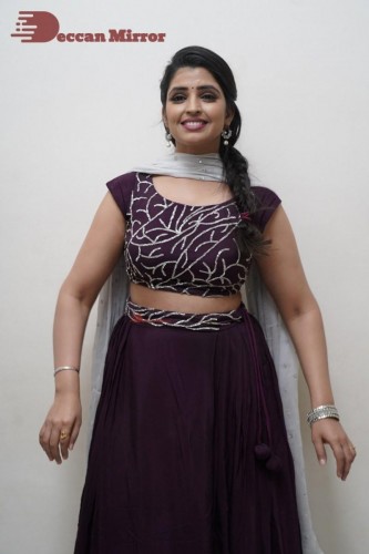 TV Anchor Syamala poses for pictures in a purple dress