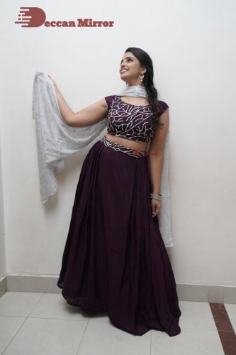 TV Anchor Syamala poses for pictures in a purple dress
