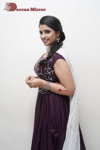 TV Anchor Syamala poses for pictures in a purple dress
