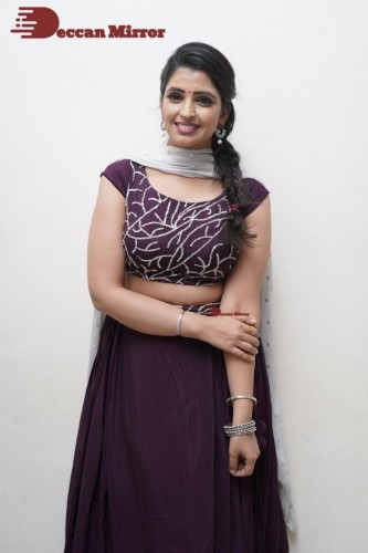 TV Anchor Syamala poses for pictures in a purple dress