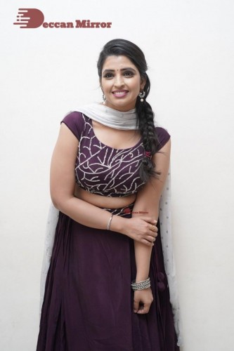 TV Anchor Syamala poses for pictures in a purple dress