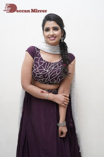 TV Anchor Syamala poses for pictures in a purple dress