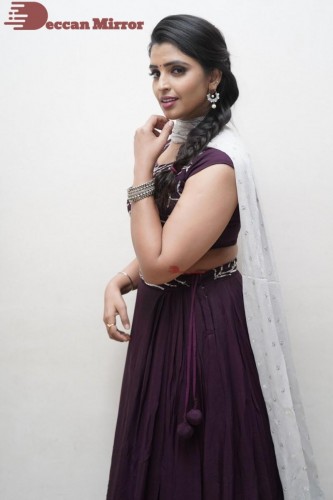 TV Anchor Syamala poses for pictures in a purple dress