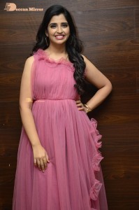 Anchor Syamala in a pink dress