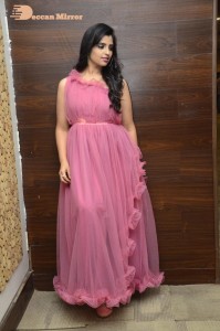 Anchor Syamala in a pink dress
