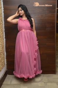 Anchor Syamala in a pink dress