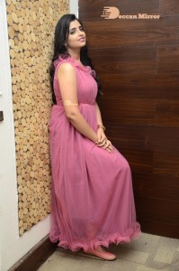 Anchor Syamala in a pink dress