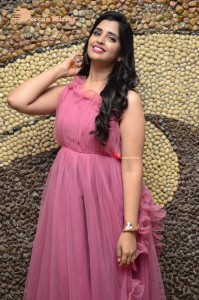 Anchor Syamala in a pink dress