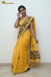 Telugu anchor syamala photoshoot in a yellow saree