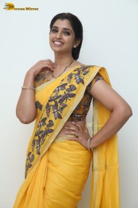Telugu anchor syamala photoshoot in a yellow saree