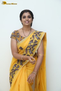 Telugu anchor syamala photoshoot in a yellow saree