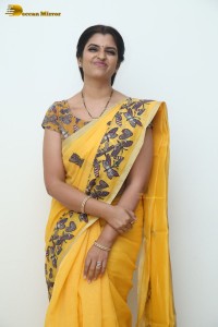 Telugu anchor syamala photoshoot in a yellow saree
