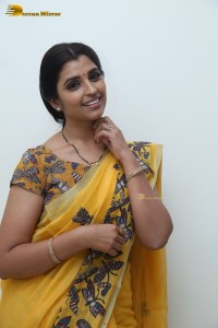 Telugu anchor syamala photoshoot in a yellow saree