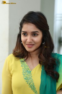 Indian actress anikha surendran in a yellow salwar kameez