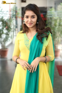 Indian actress anikha surendran in a yellow salwar kameez