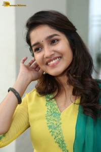 Indian actress anikha surendran in a yellow salwar kameez