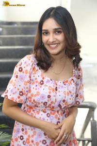 actress anikha surendran in a pink and white floral dress