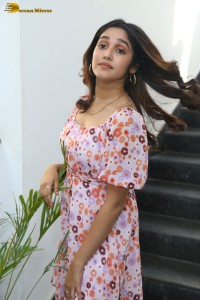 actress anikha surendran in a pink and white floral dress