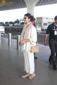 veteran bollywood actress Anita Raj spotted at mumbai airport in a white dress