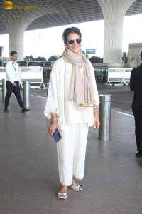 veteran bollywood actress Anita Raj spotted at mumbai airport in a white dress
