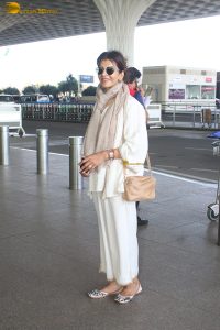 veteran bollywood actress Anita Raj spotted at mumbai airport in a white dress