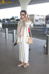 veteran bollywood actress Anita Raj spotted at mumbai airport in a white dress