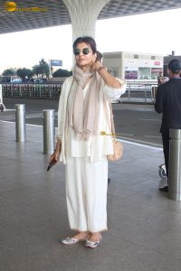 veteran bollywood actress Anita Raj spotted at mumbai airport in a white dress
