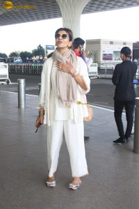 veteran bollywood actress Anita Raj spotted at mumbai airport in a white dress