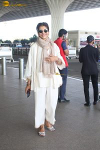veteran bollywood actress Anita Raj spotted at mumbai airport in a white dress