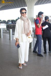 veteran bollywood actress Anita Raj spotted at mumbai airport in a white dress