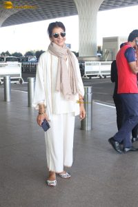 veteran bollywood actress Anita Raj spotted at mumbai airport in a white dress