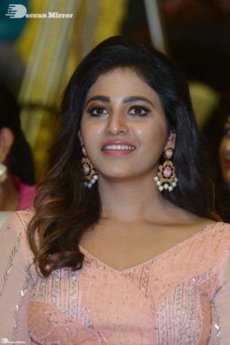 Telugu and Tamil Actress Anjali at a cinema event in light orange dress