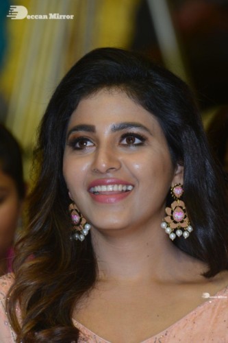 Telugu and Tamil Actress Anjali at a cinema event in light orange dress