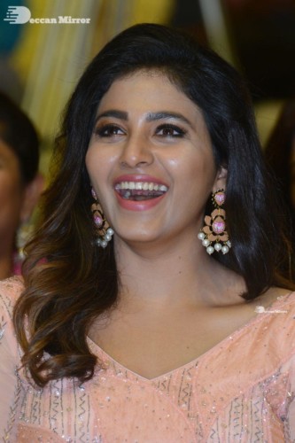 Telugu and Tamil Actress Anjali at a cinema event in light orange dress