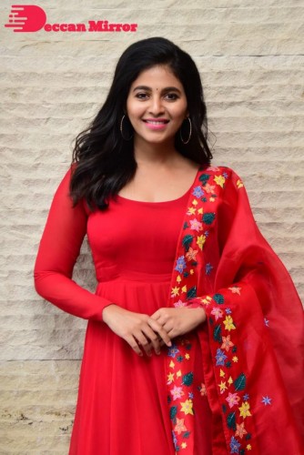 Tamil and Telugu Actress Anjali looks cute as she poses for pictures in a Red Salwar Kameez
